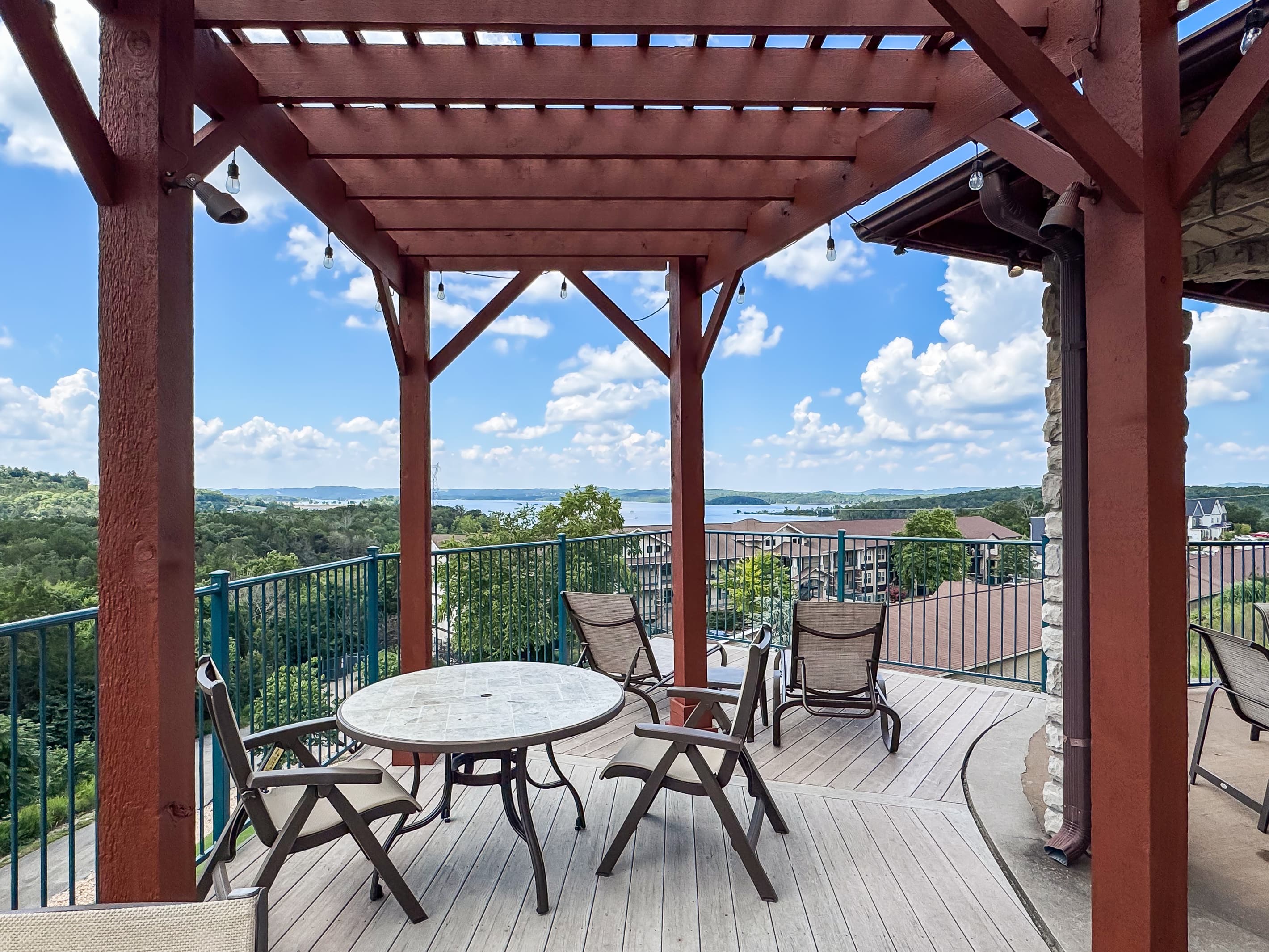 Pergola at neighborhood pool with view of Table Rock Lake