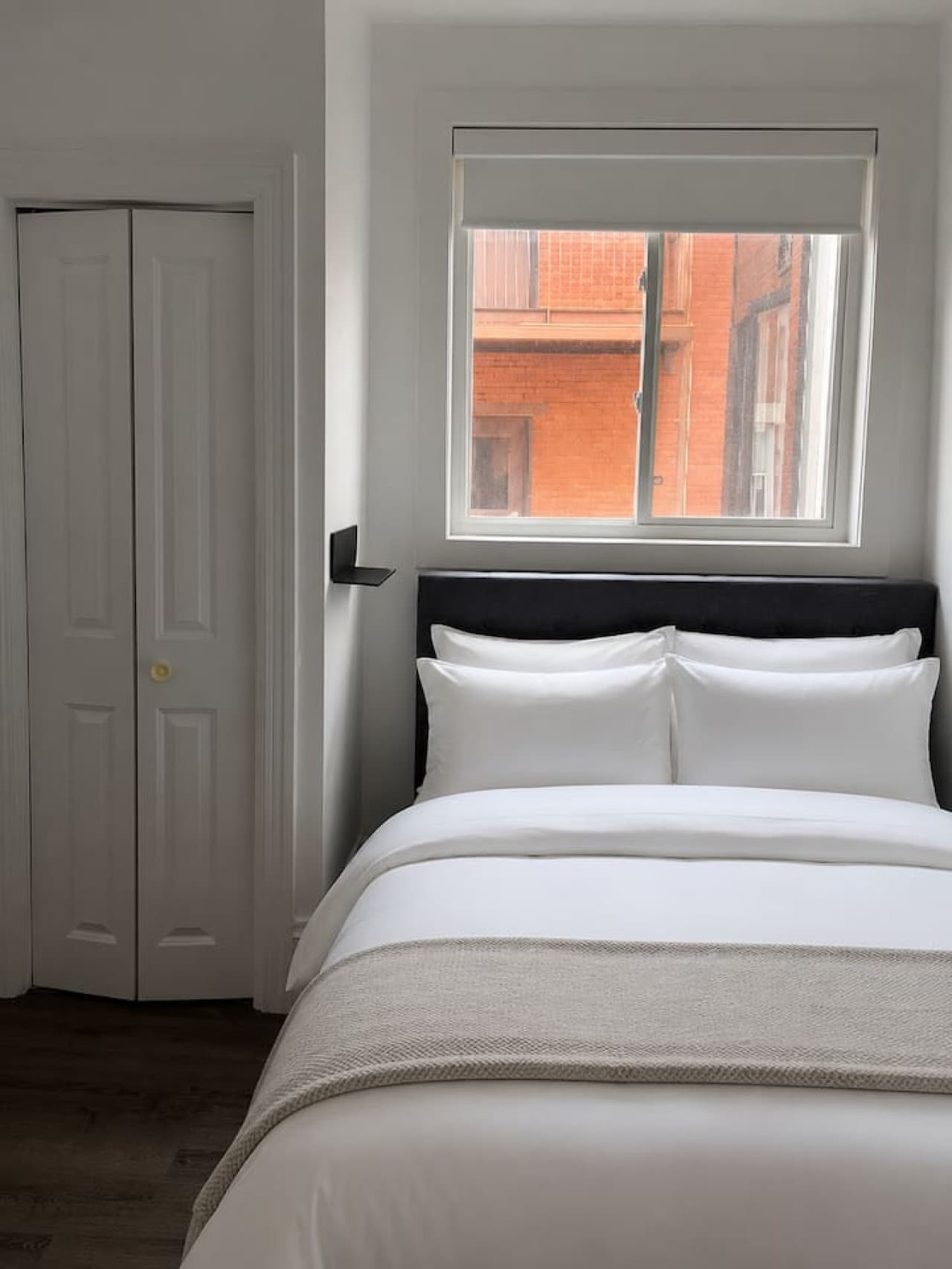 Note - this closely resembles how we make our beds but at the time of taking photos the linens had not arrived yet. The bed was made by AI. 
Will update this photo as soon as we make the bed by humans!