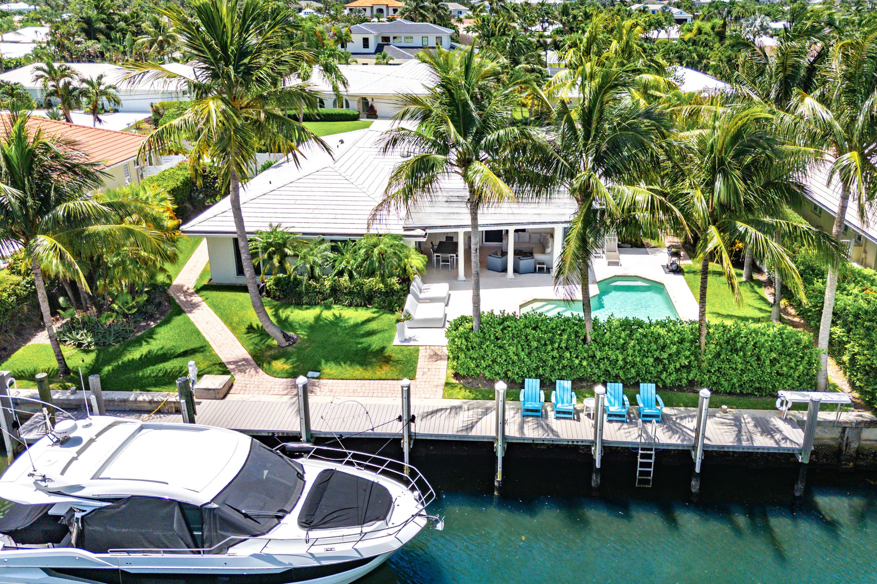 The boat shown is privately owned and not available for guest use. A separate portion of the dock is available for approved guest boats, subject to size restrictions and an additional fee.