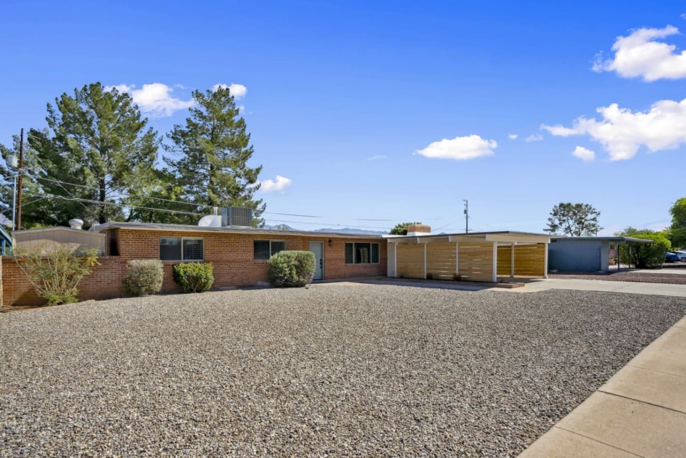 Spacious backyard w/ pool & patio, offering plenty of room to unwind outside.