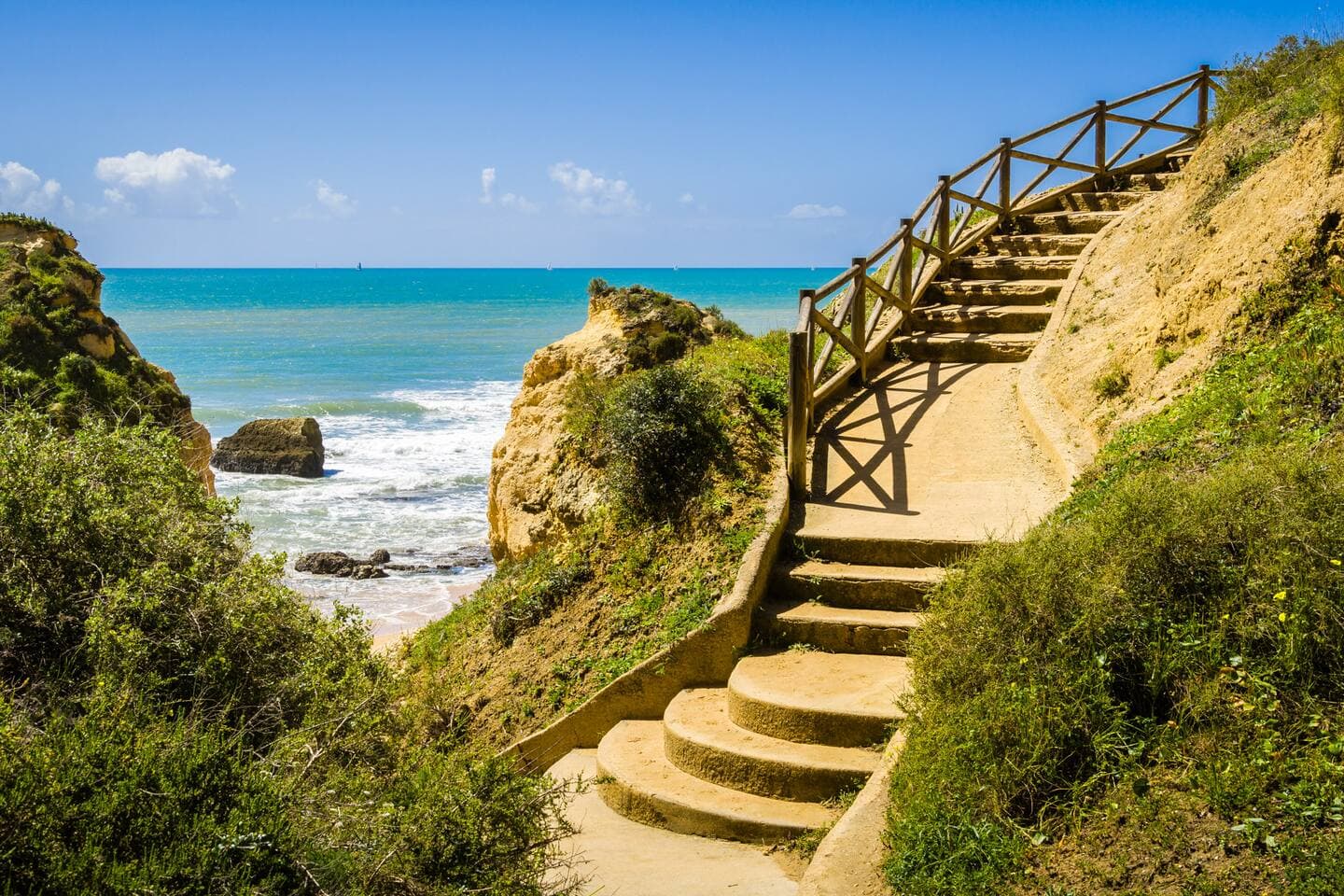 Access to the beach and trail above the sea. 