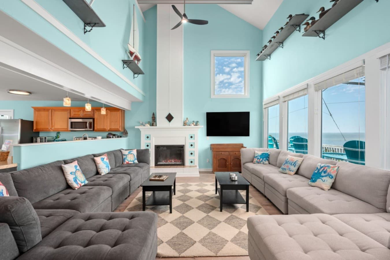 Open kitchen & dining area w/ warm wood finishes & easy flow into the living space.