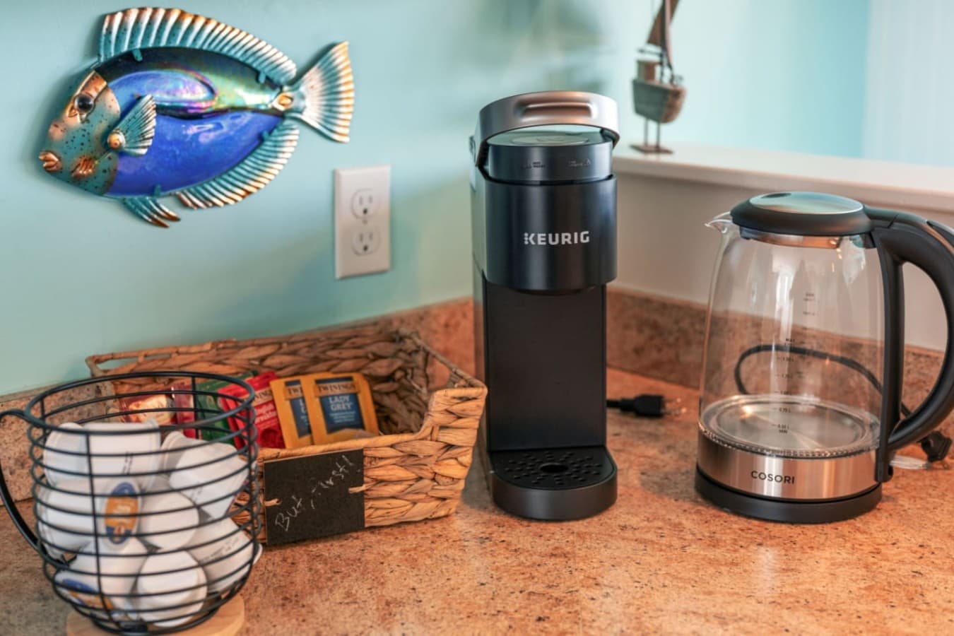 Coffee station w/ drip maker & supplies, ready for easy mornings at home.