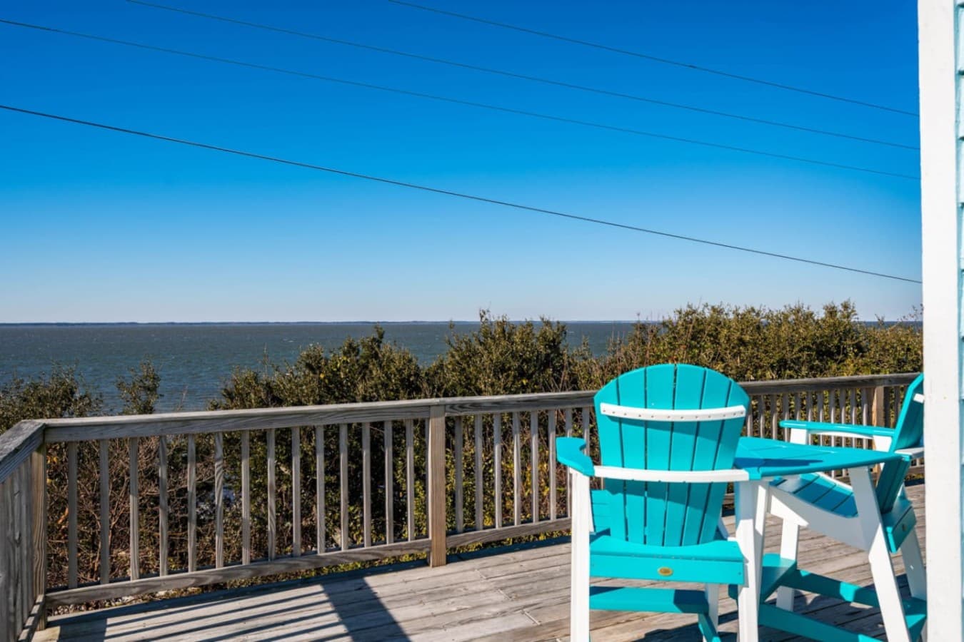 Deck seating overlooking the water, an easy place to relax & enjoy the breeze.