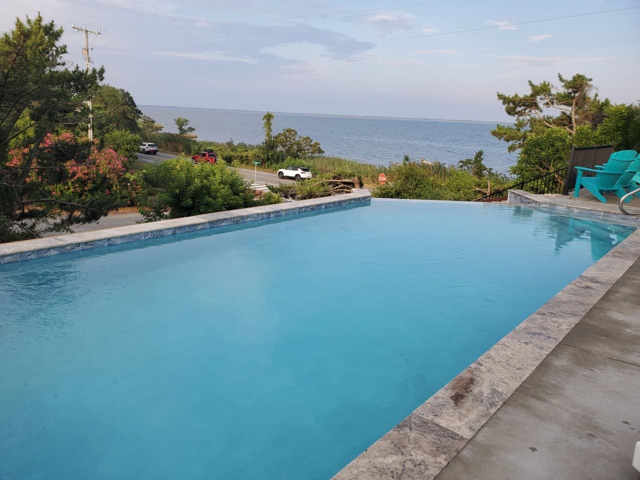 Infinity-edge pool looking straight out over the sound to the far shore.