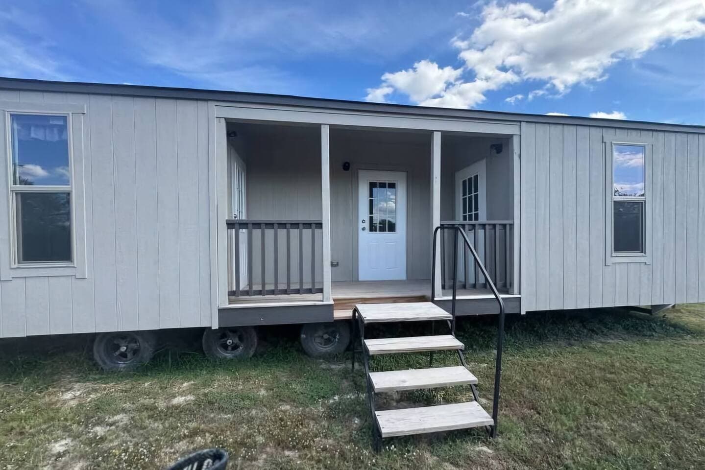 Tiny house with 2 hotel style rooms and a laundry