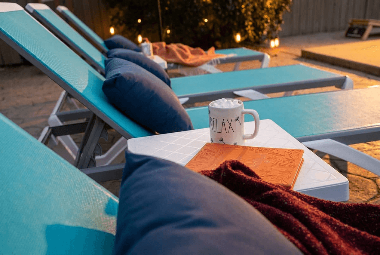 Not warm out? Grab a cup of hot chocolate and cozy up with a book and a throw blanket.