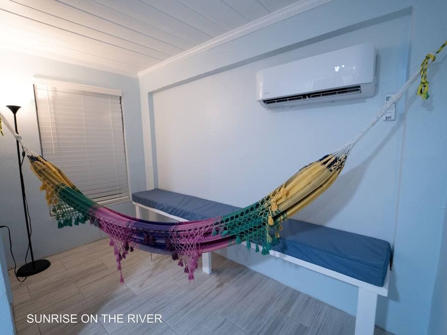 Our Relaxing hammock and Social Area (Under AC)