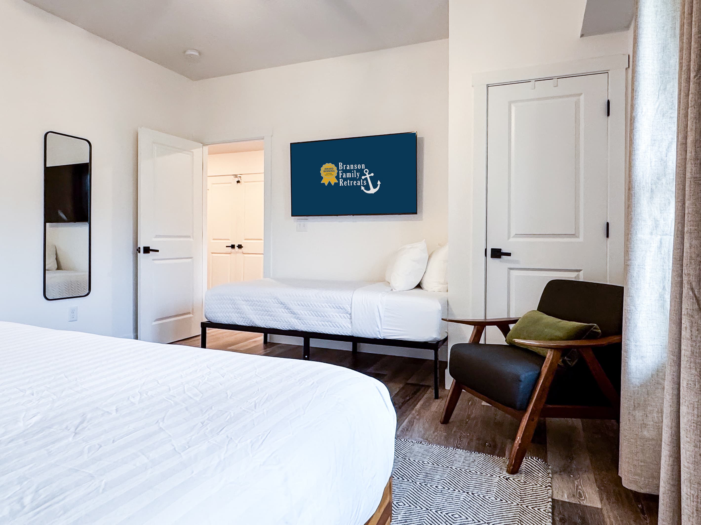 Bedroom 1 (main level): Twin bed and Tv