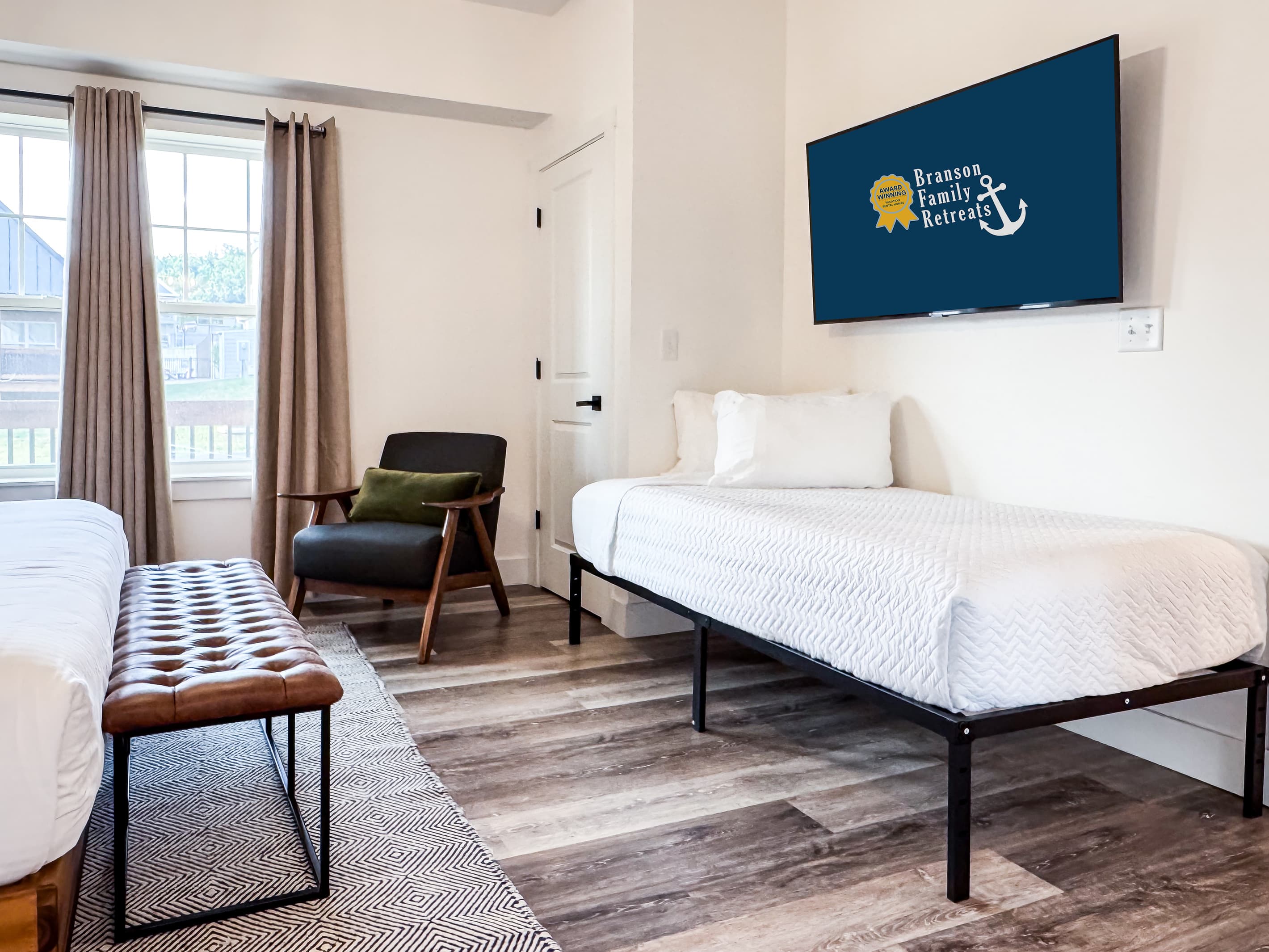 Bedroom 2 (main level): Twin bed with Tv