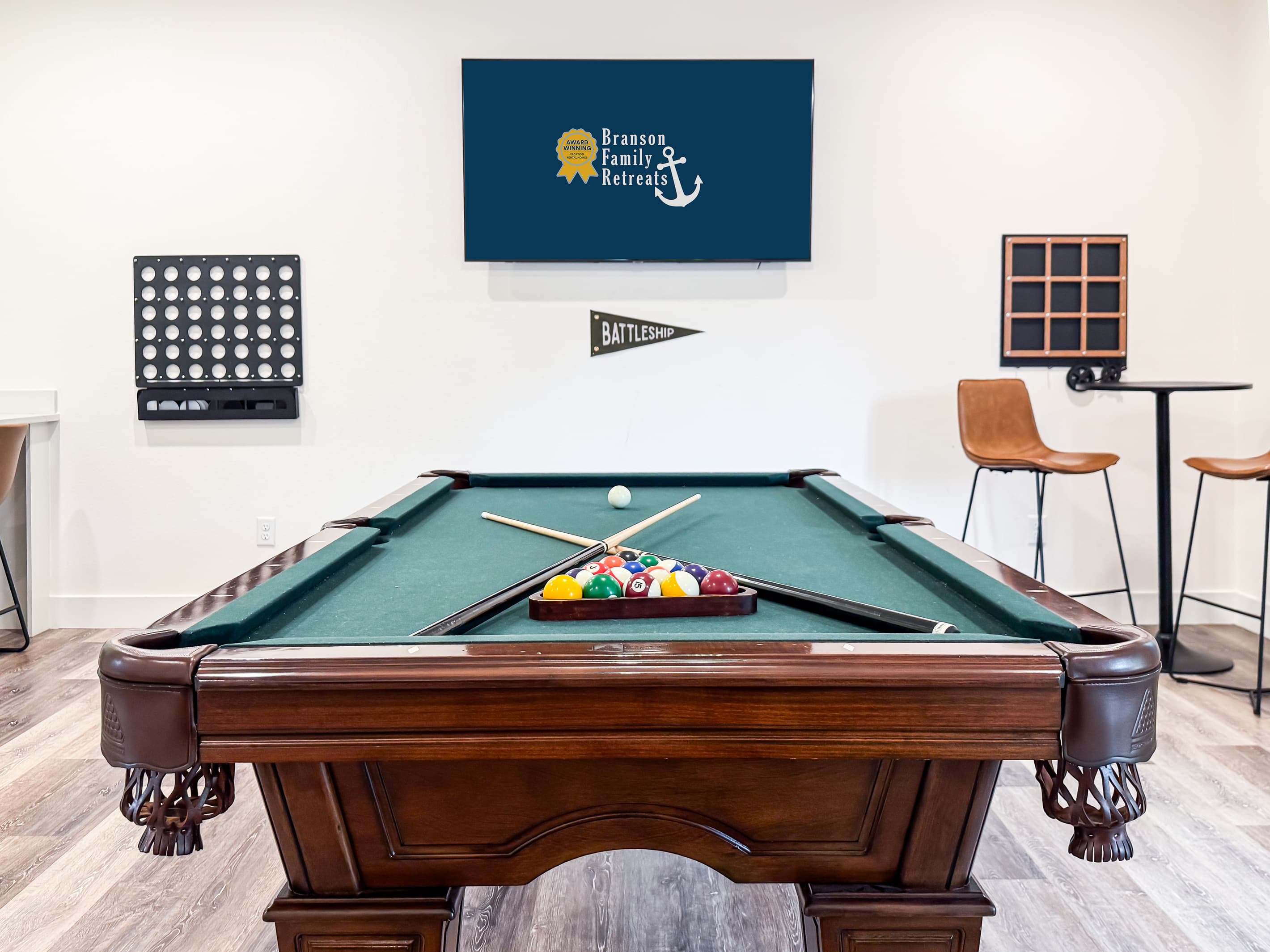 Pool table area with TV to watch while playing
