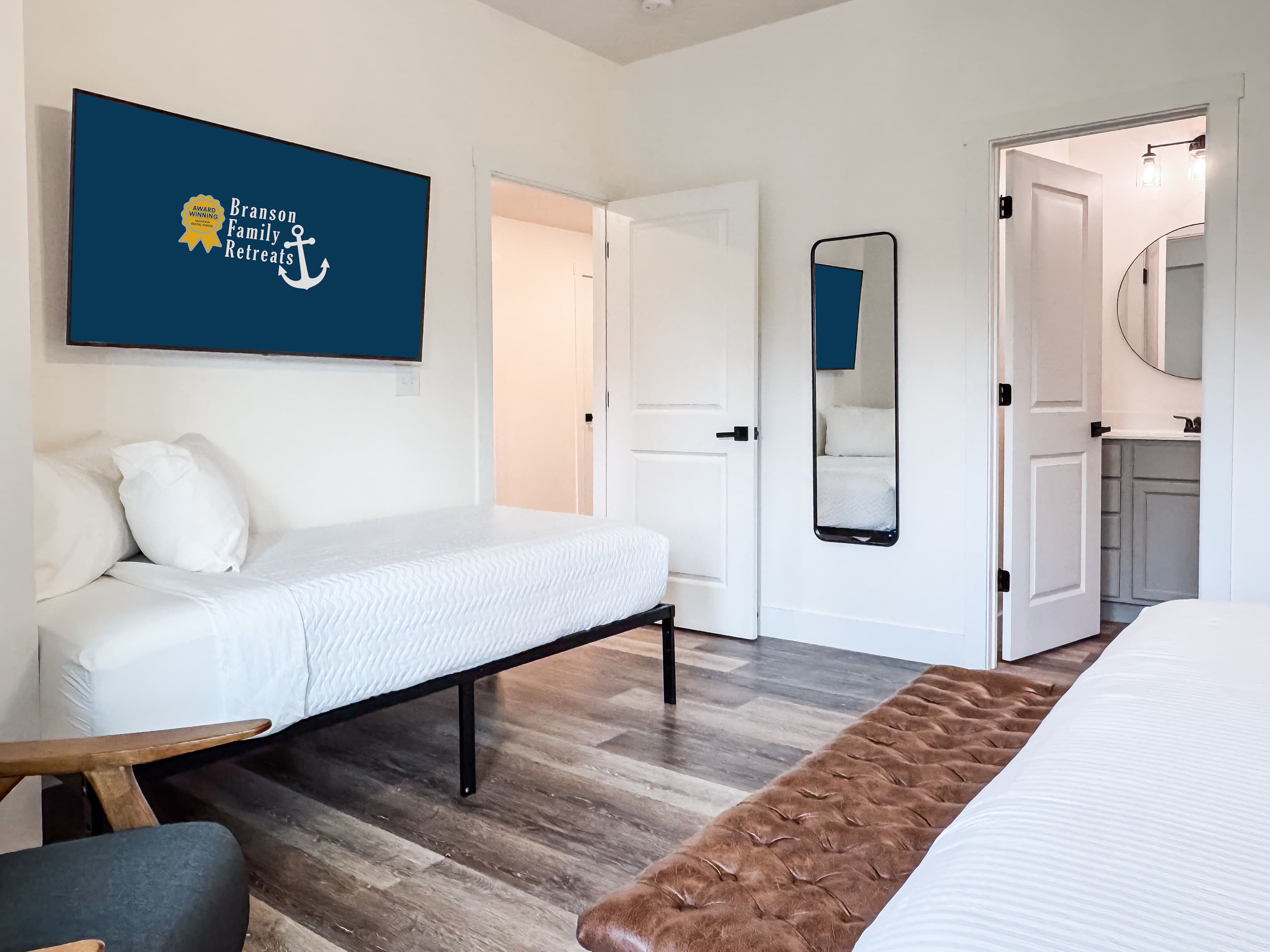 Bedroom 4 (upper level): Twin bed with Tv and full length mirror