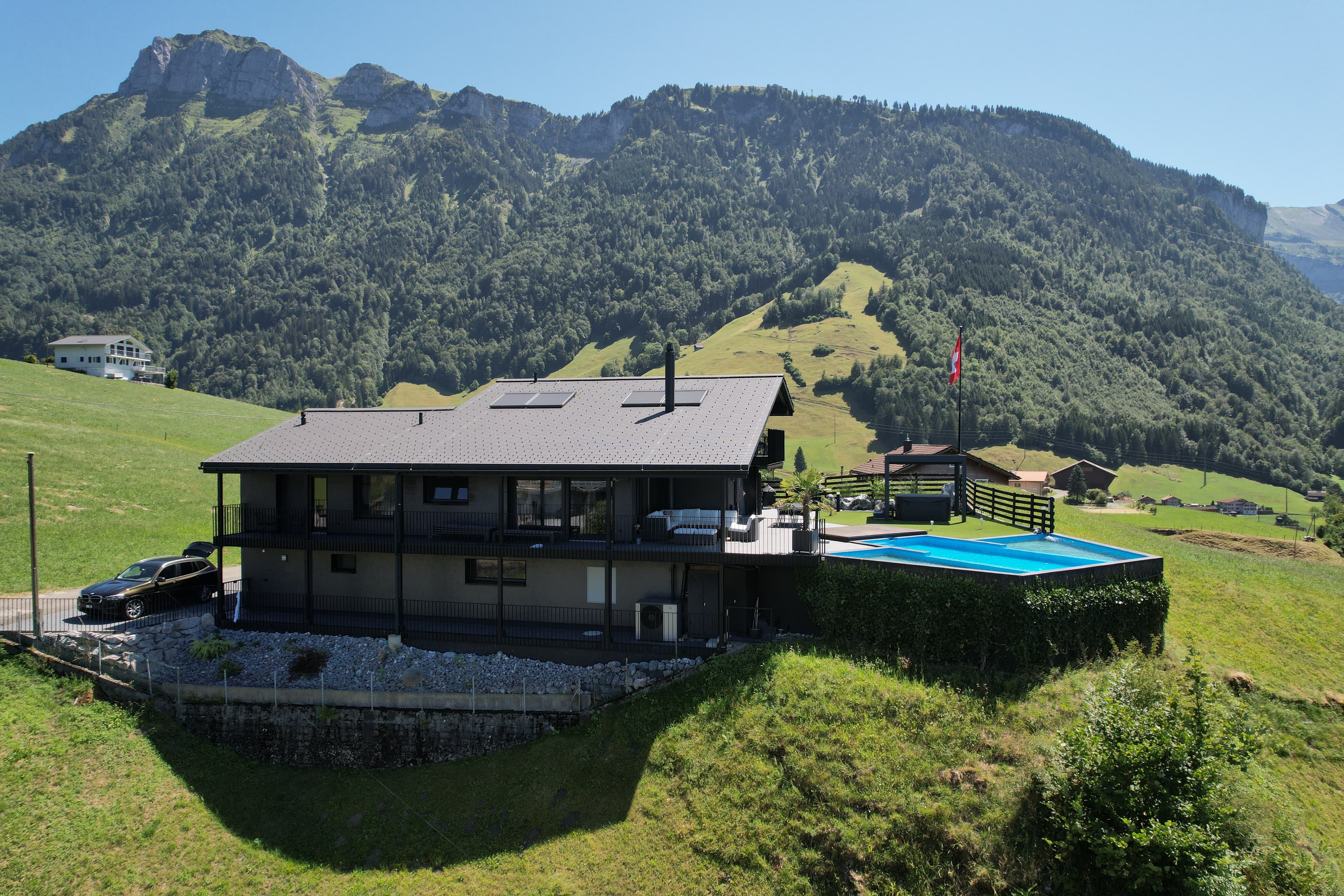 Villa tauris exterior alpine setting natural pool