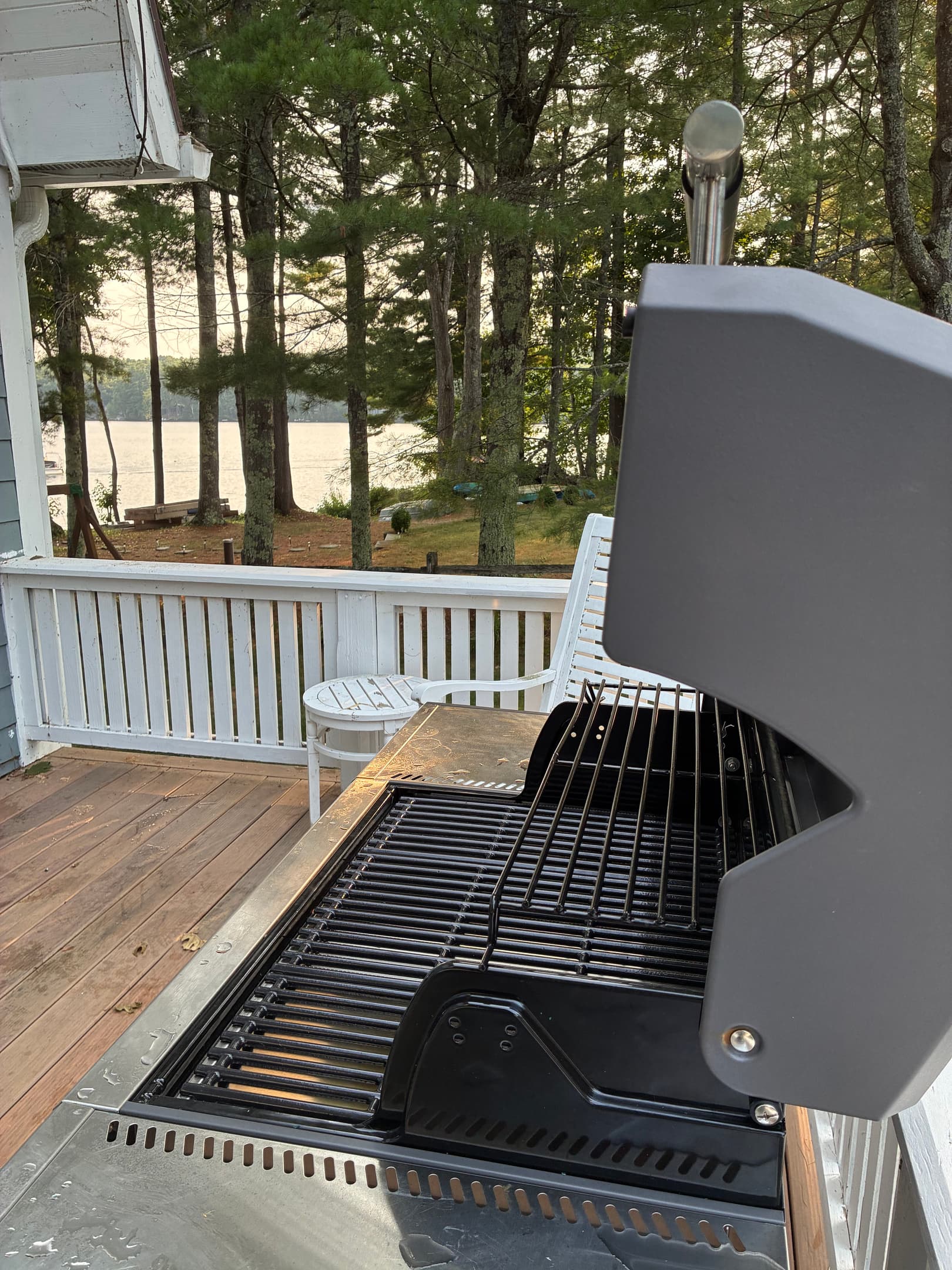 Gas grill on deck outside kitchen.