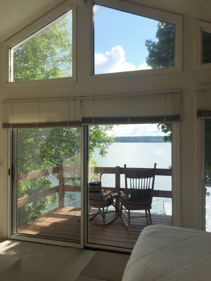 Master Bedroom - vaulted ceilings and private deck.  Please bring in chairs b4 u leave and when raining