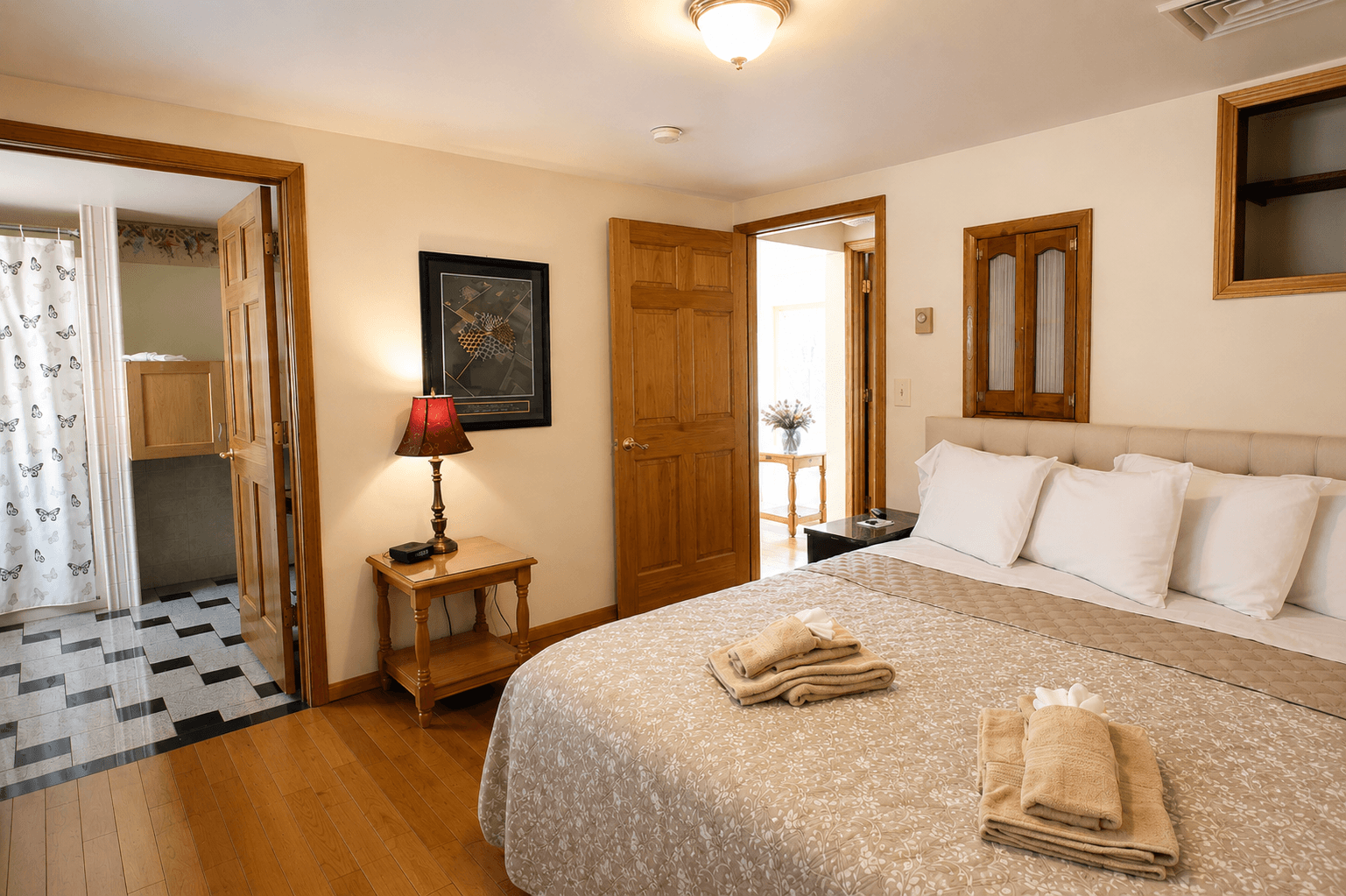 Bedroom #5 with King bed and en suite handicapped accessible bath