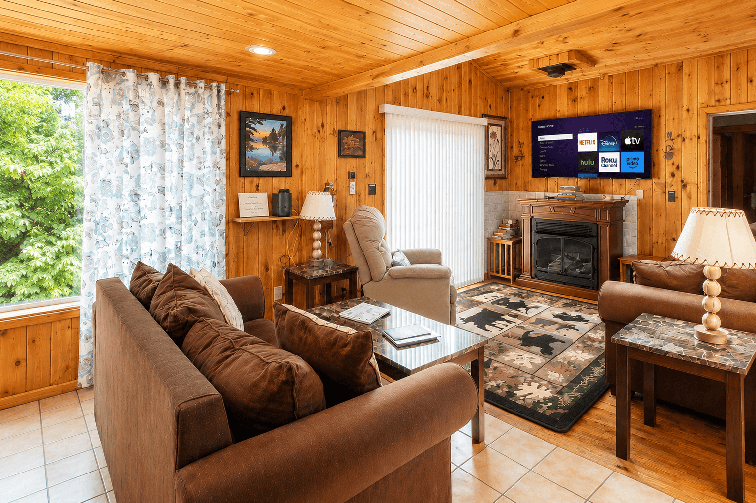 Living room with 55" (or larger) flat screen smart TV with Roku.  Bring your favorite streaming apps to never miss the action of your favorite team!