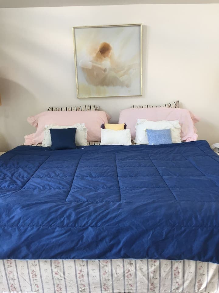 Large Master Bedroom with attached bath and private terrace.  Bedspread to subject to change without notice.  