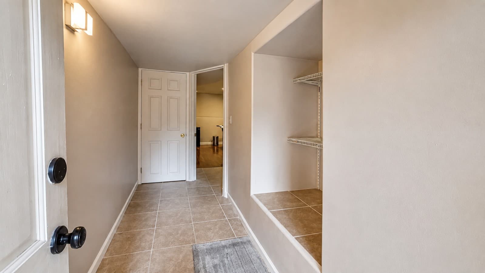 Settle in comfortably with a convenient entryway and built-in space for your shoes, bags, and travel essentials..png