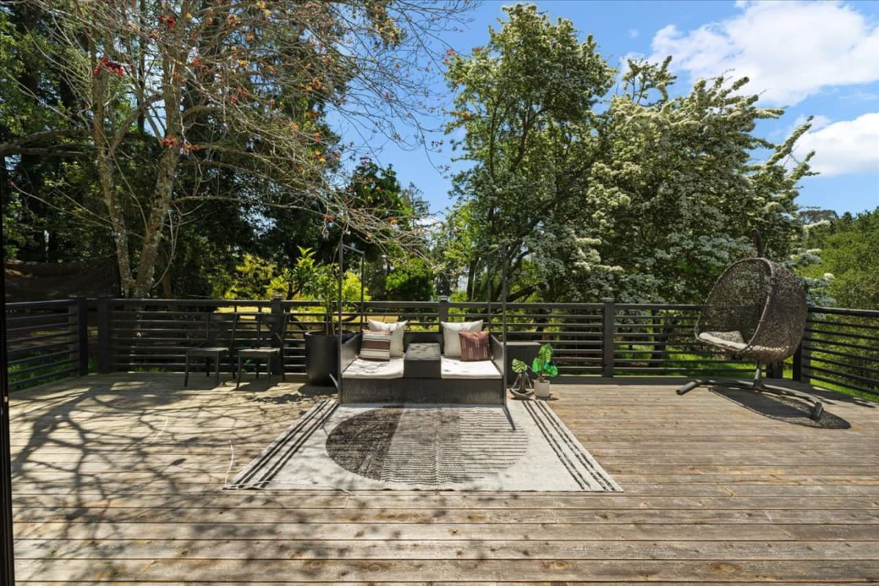 Outdoor patio with multiple seating options.