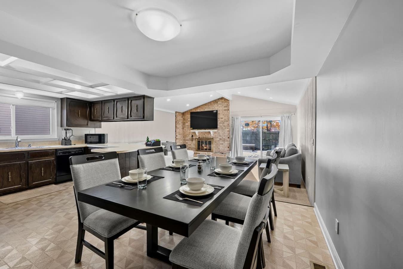 A spacious dining area set for group meals and gatherings.