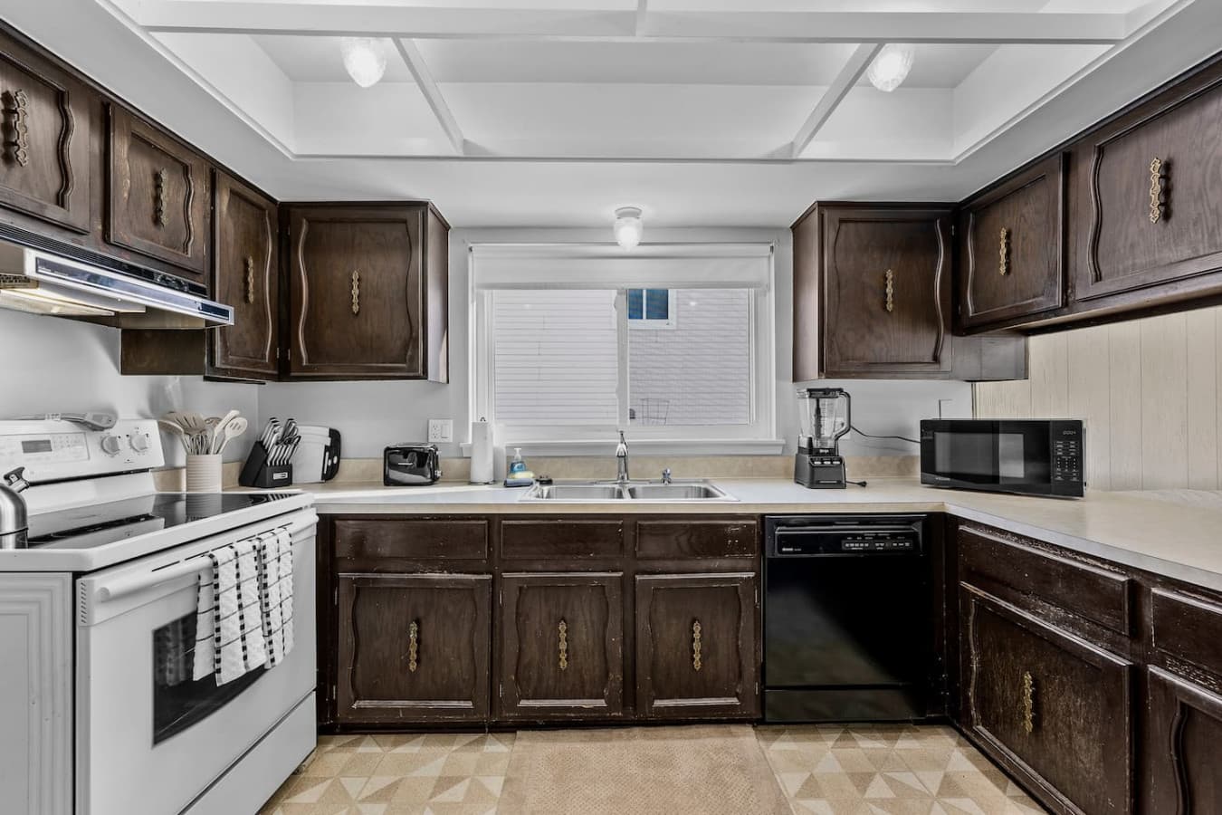 A fully equipped kitchen with plenty of counter space for meal prep.
