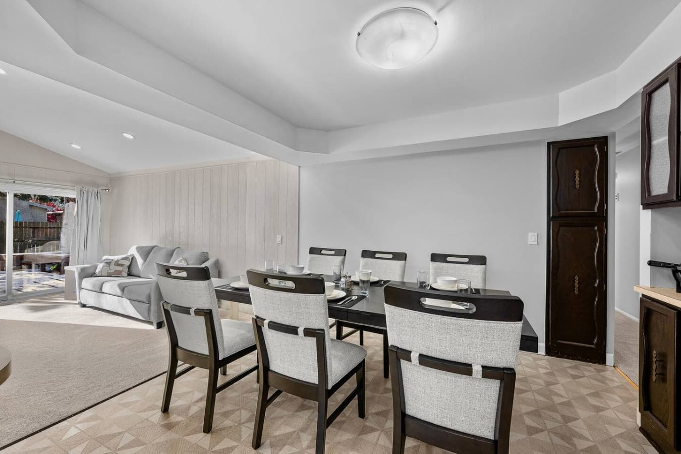 A comfortable dining space that flows into the living room.