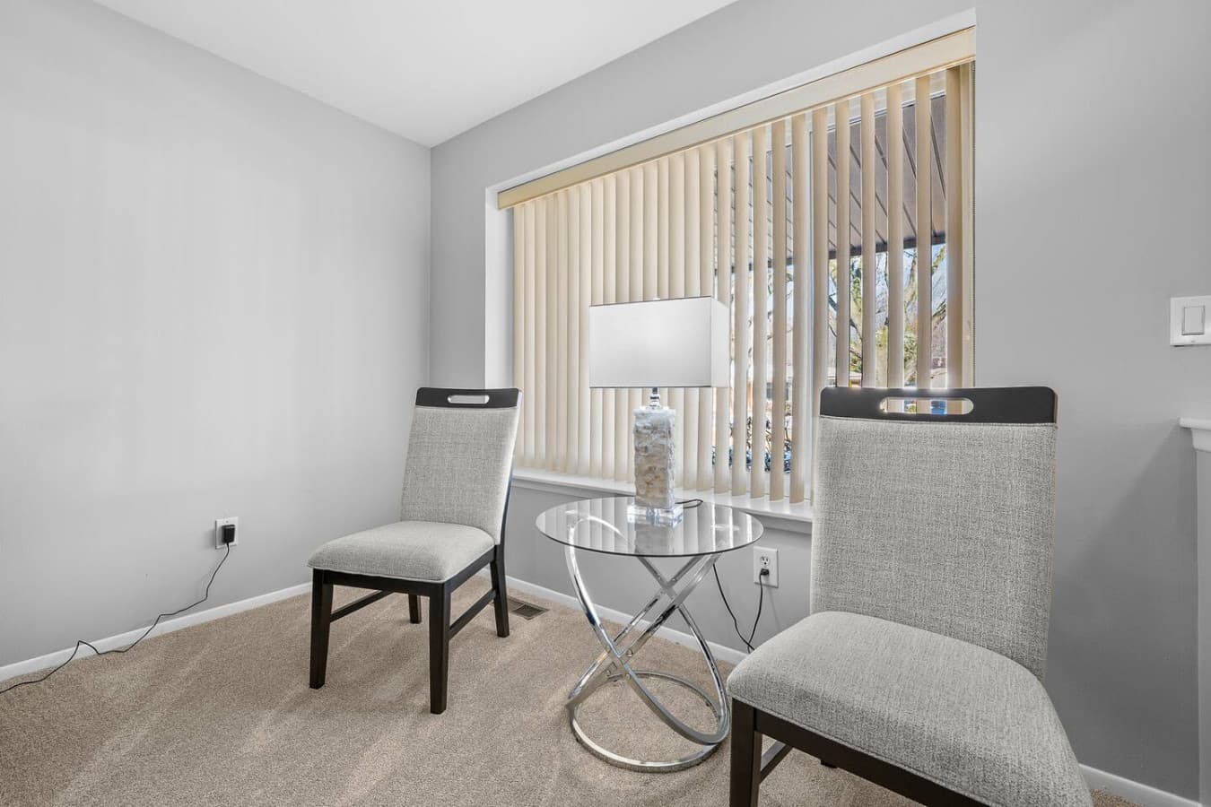A quiet corner with seating perfect for reading or relaxing.