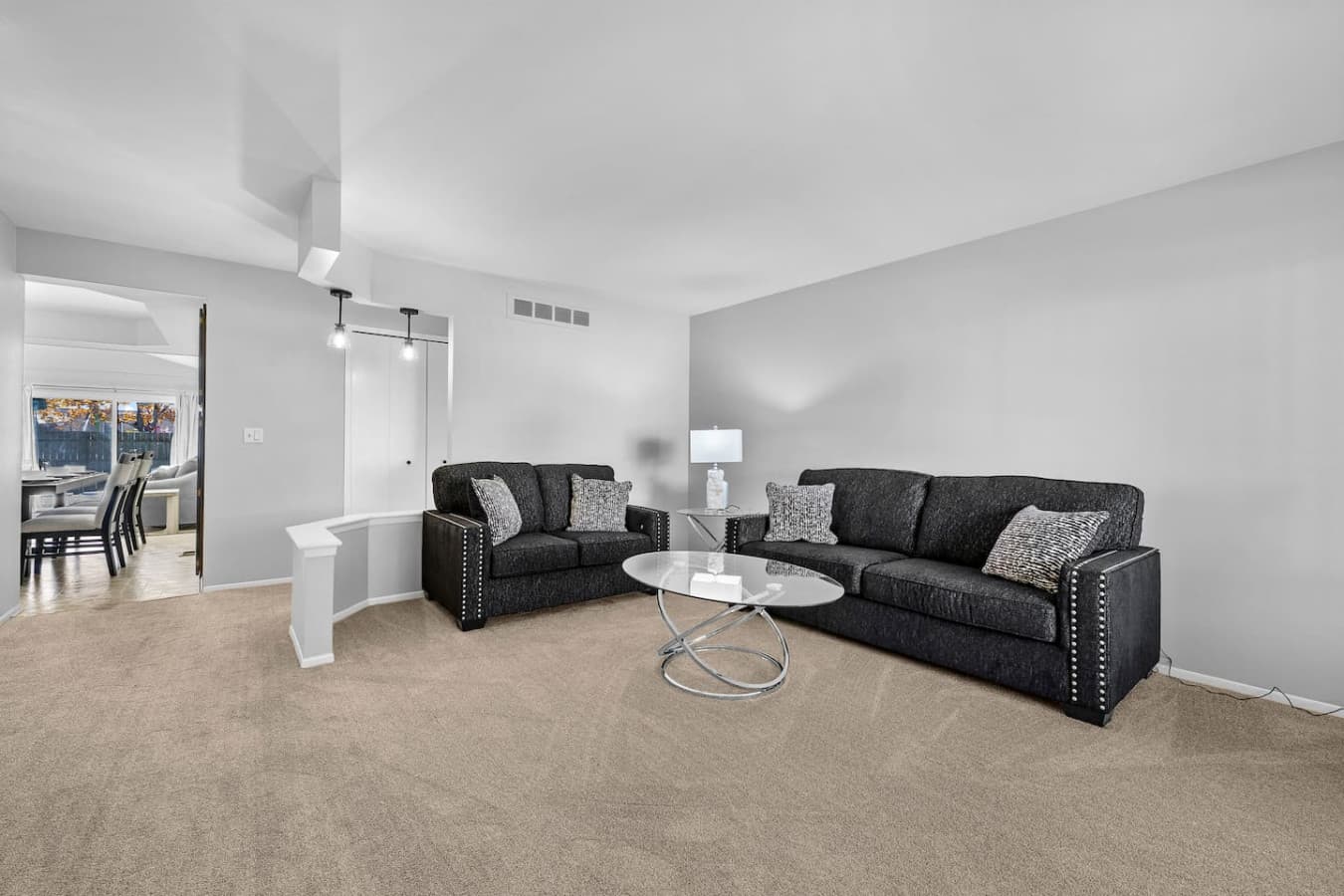 A cozy lounge space with stylish decor and soft lighting.