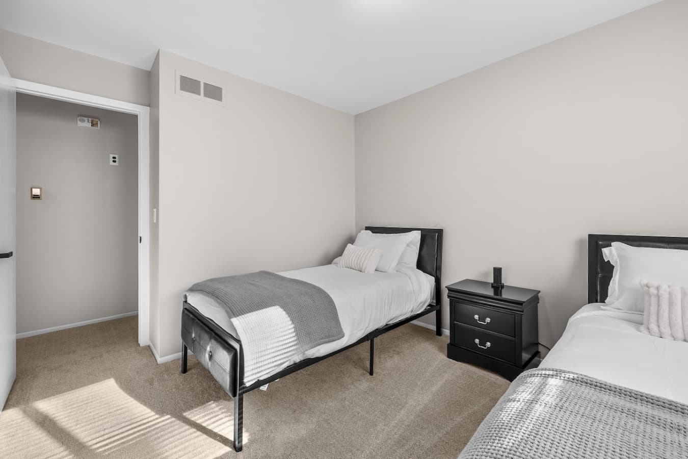 A simple and cozy room ideal for children or additional guests.