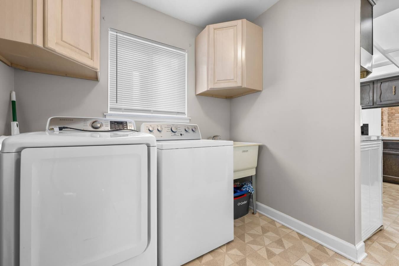 A convenient laundry room equipped with a washer and dryer.