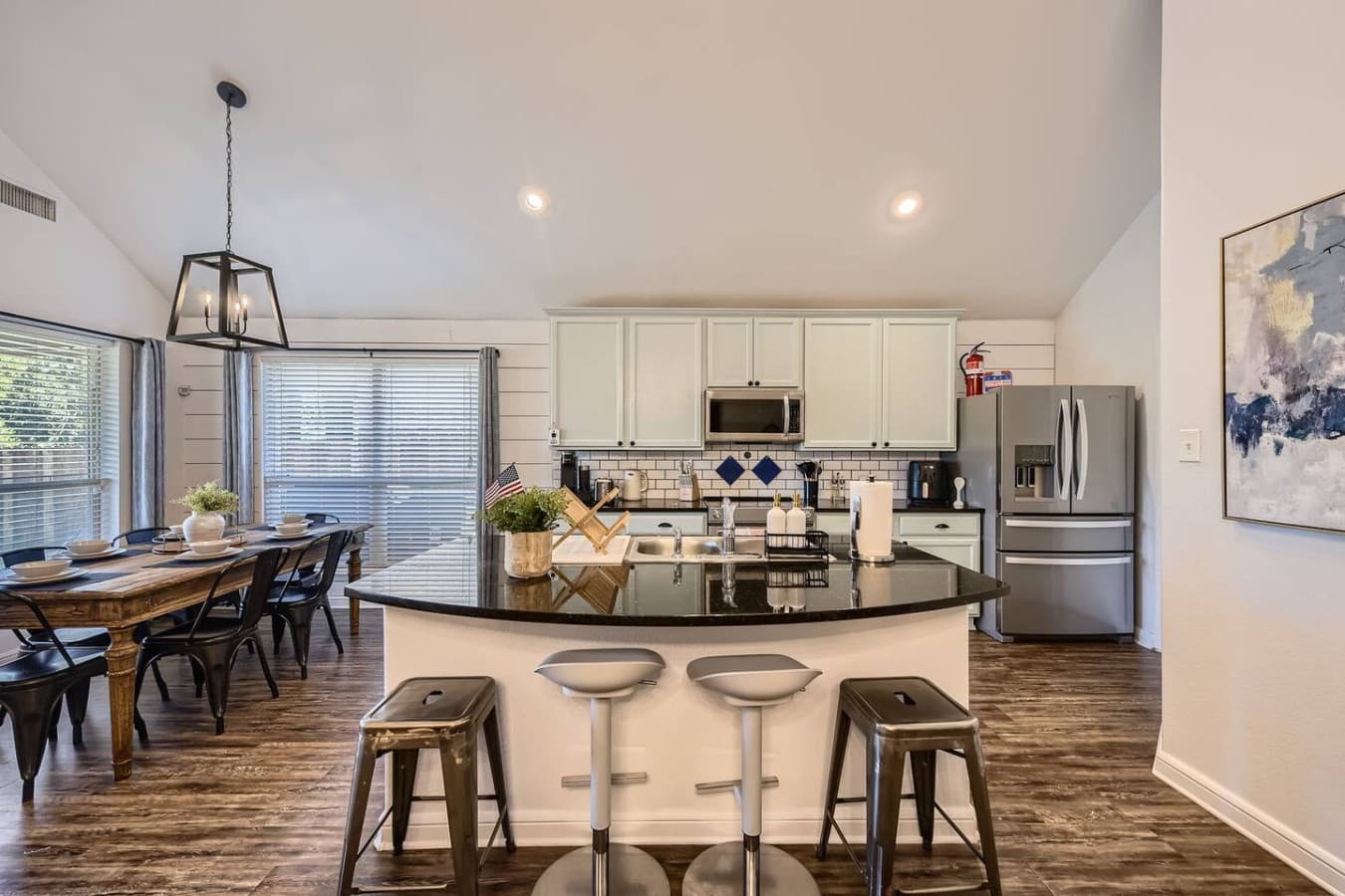 Bar seating at the kitchen island, up to four spaces.