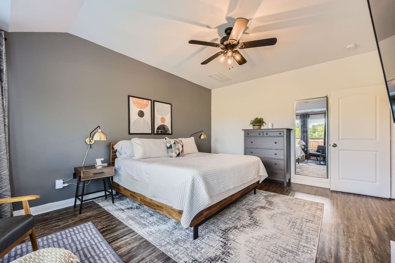 Primary bedroom featuring a king size bed.