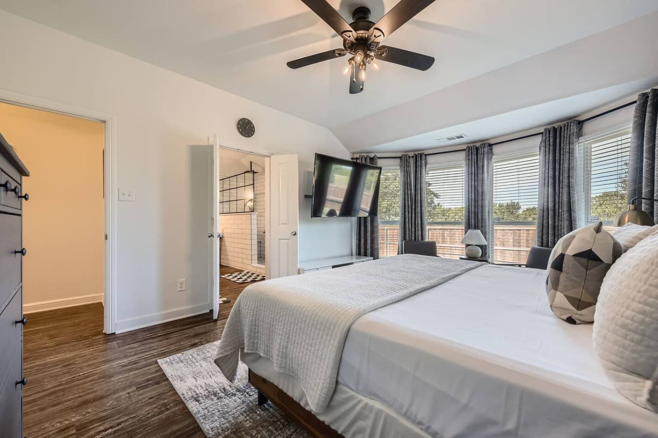 Experience serene nights in the spacious king suite, featuring blackout curtains, a peaceful reading nook and a Smart TV for streaming your favorite shows.