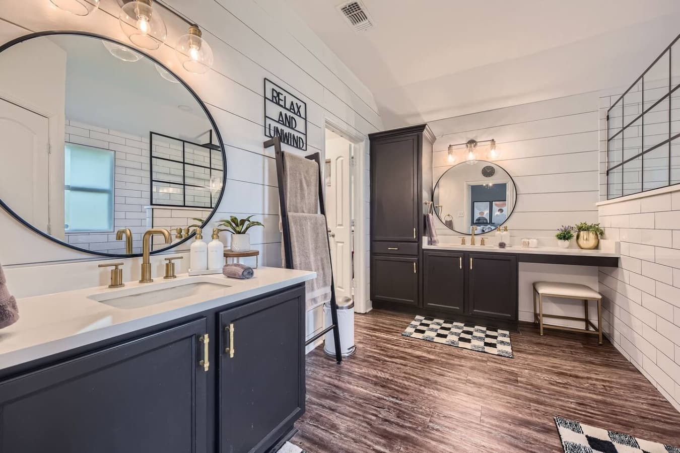 Luxurious ensuite bathroom with vanity and step in shower.