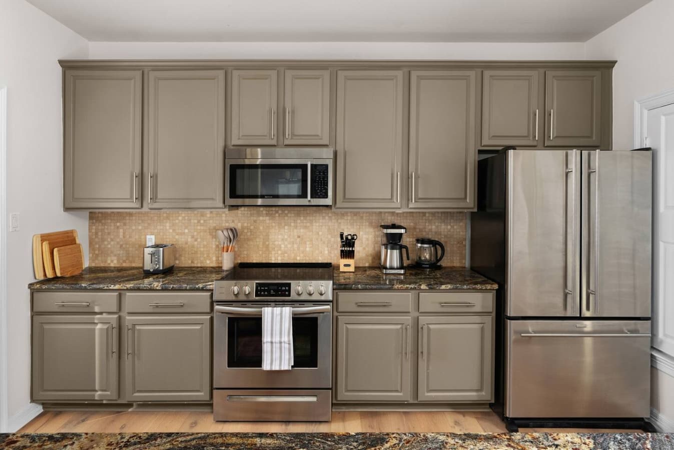 The fully-equipped kitchen is an invitation to culinary creativity. With its state-of-the-art appliances and ample workspace, it's the perfect place to experiment with new recipes and entertain guests with gourmet meals.