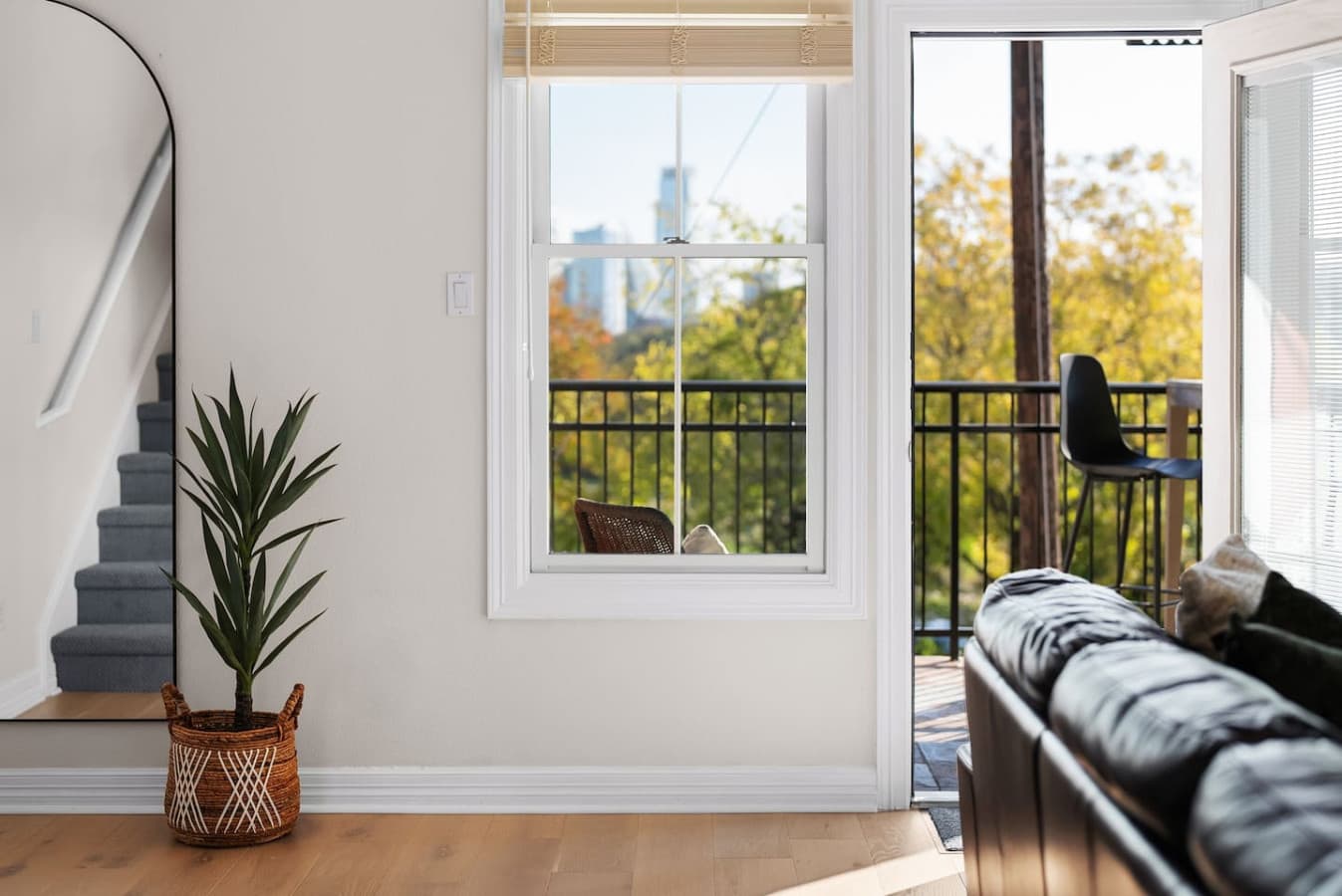 Stunning city views can be seen from the living room space.