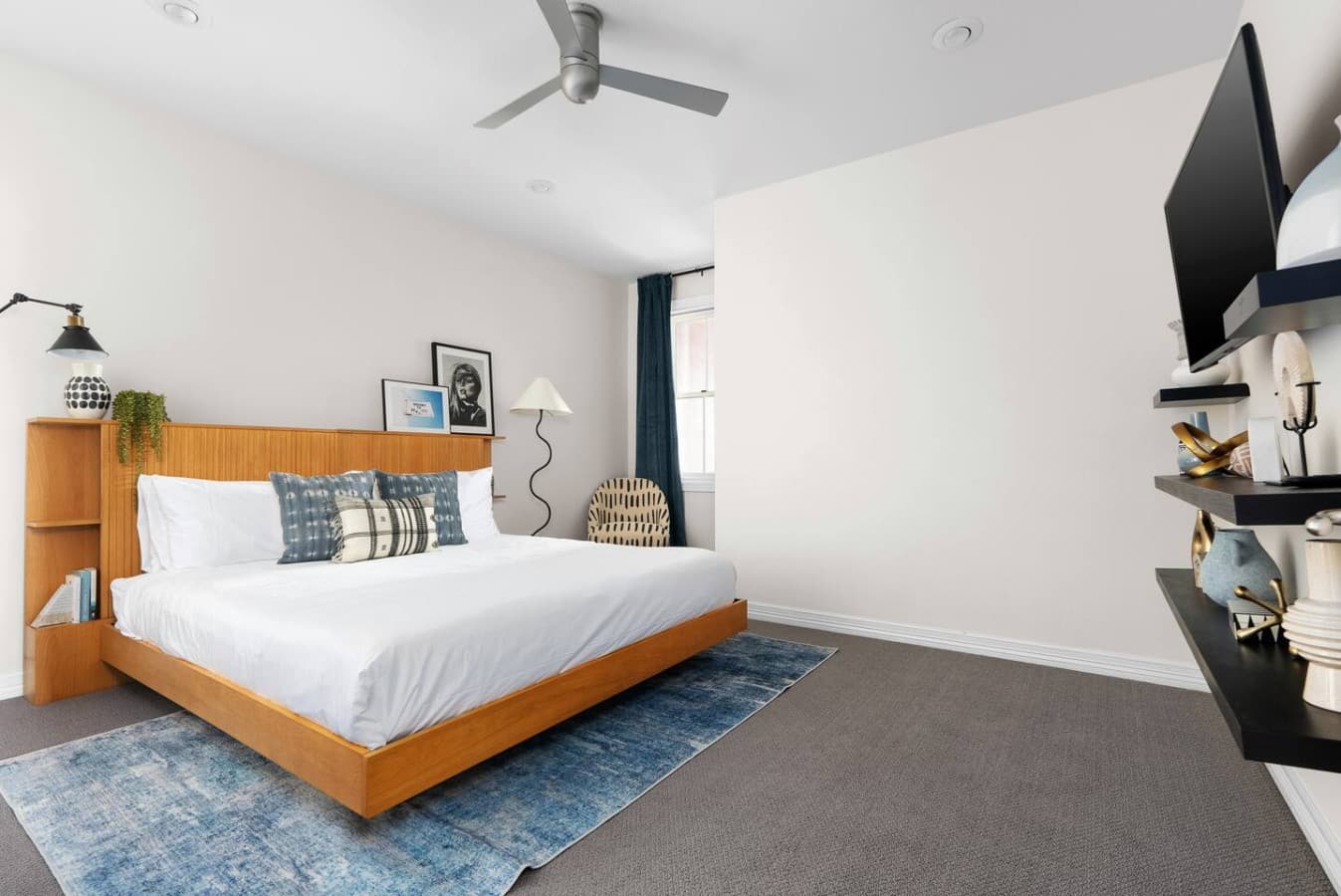This chic and stylish bedroom offers a tranquil escape. A comfortable king-sized bed, adorned with premium linens, ensures a restful night's sleep.
