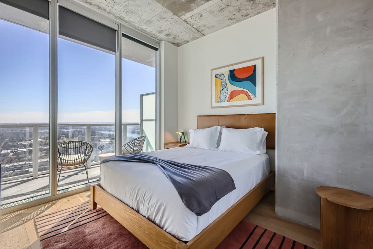 Bedroom featuring views and a queen size bed.