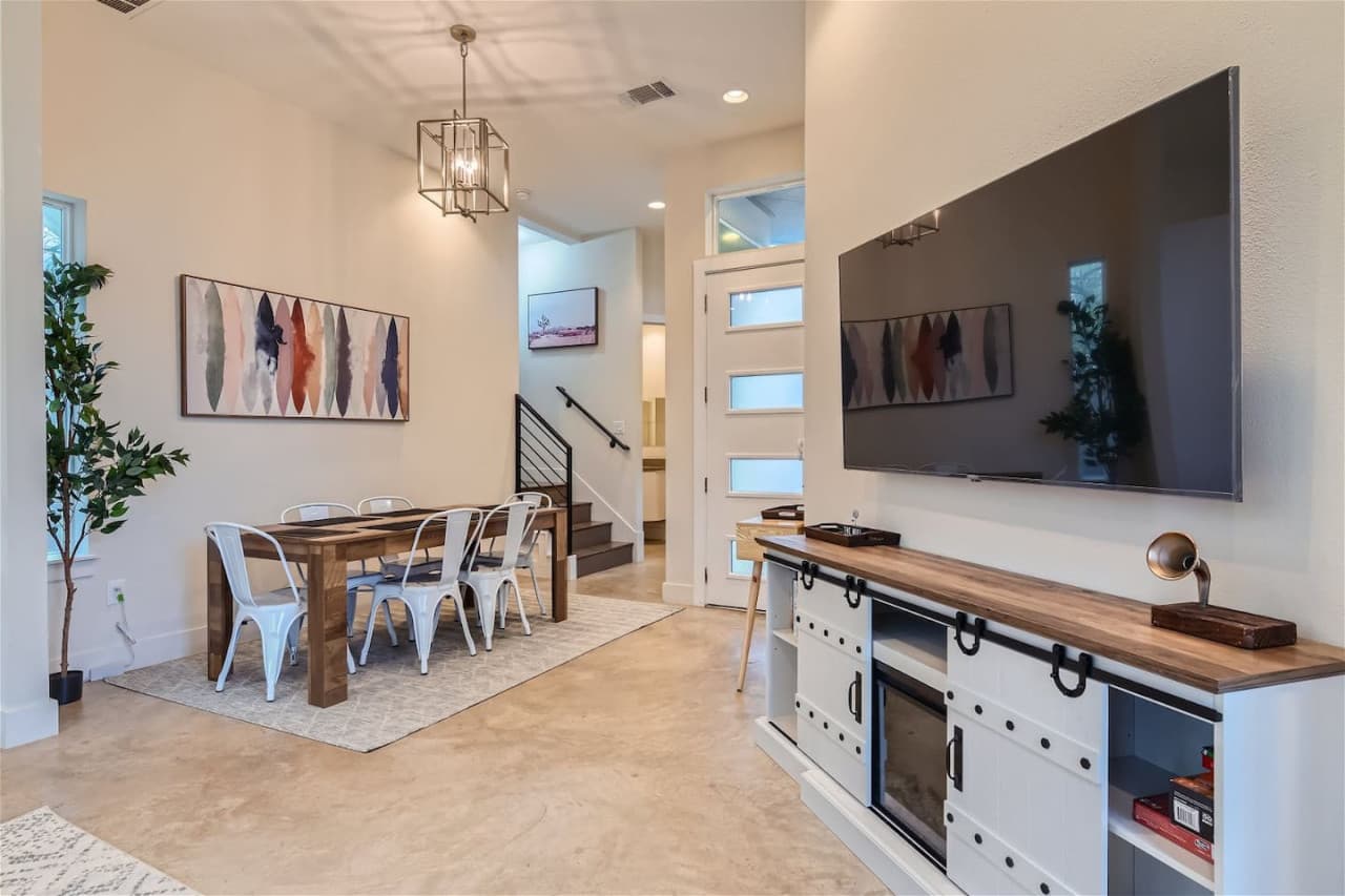 Savor your culinary creations at the dining table which features seating for up to six.
