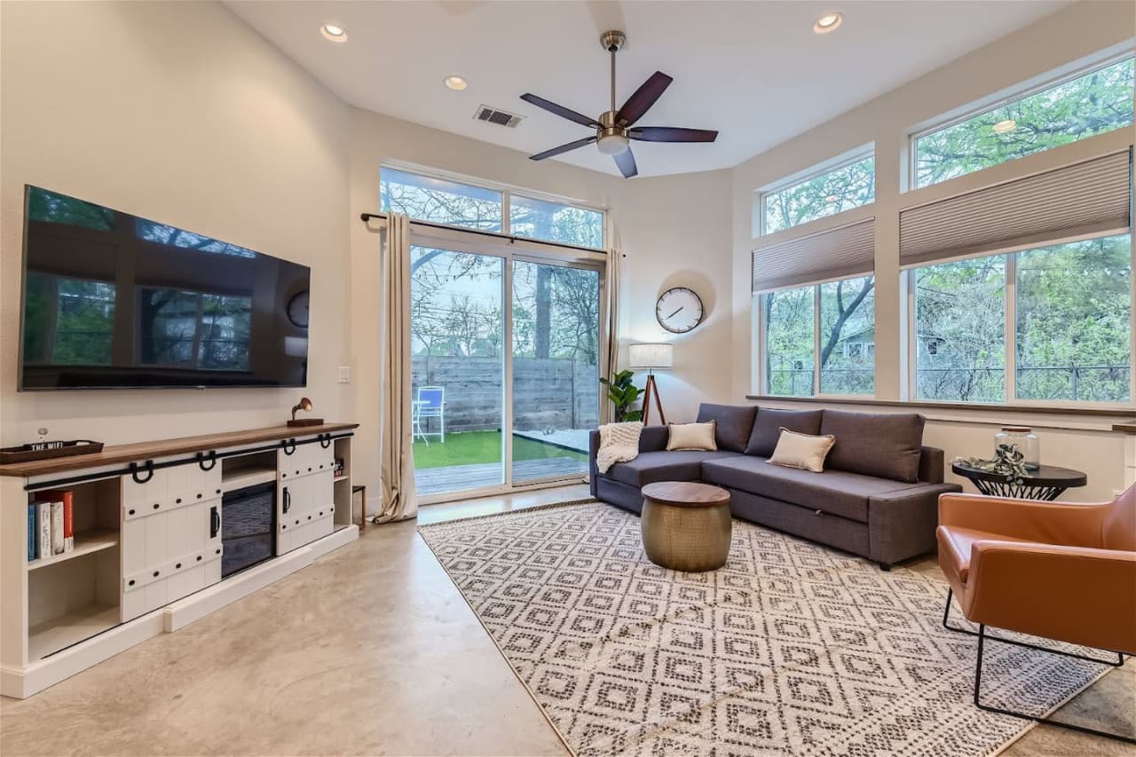 Inside, you'll find a spacious open concept living area filled with natural light, perfect for family gatherings or quiet evenings at home.