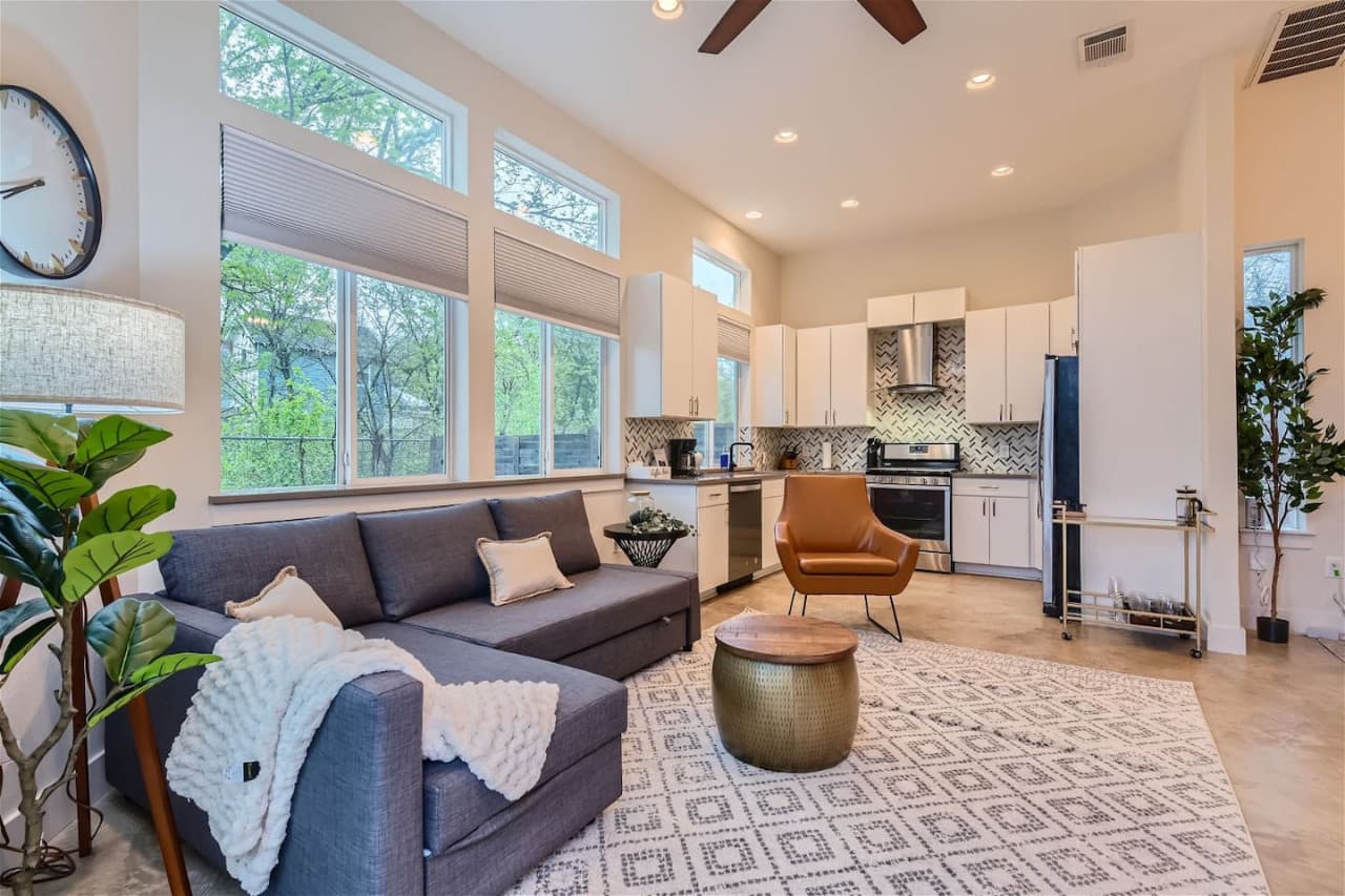 This beautifully designed space exudes comfort and tranquility, making it the perfect spot to relax after a long day. The sleek and sophisticated furniture, coupled with the tasteful decor, creates a sense of luxury and style.