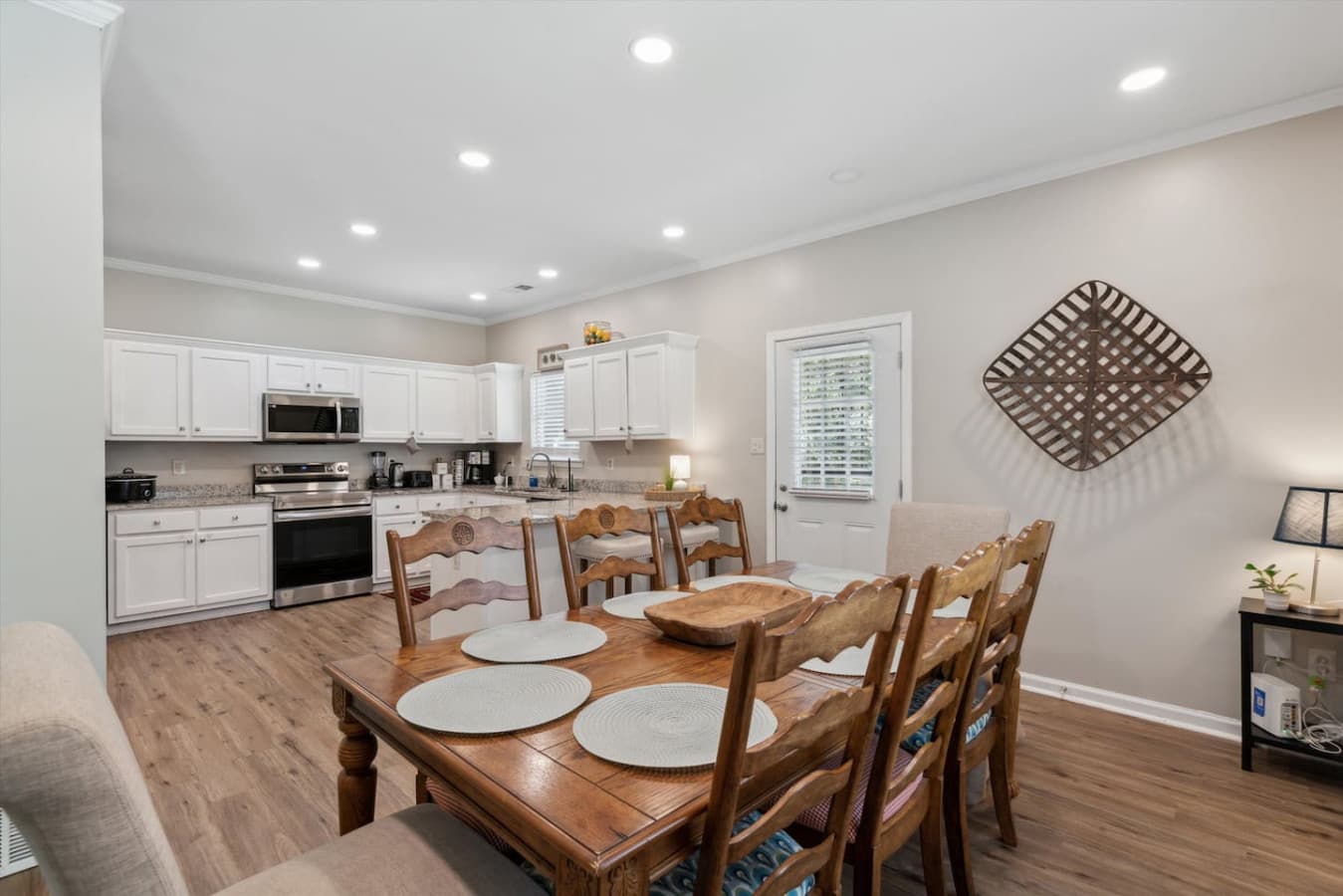 The adjoining dining area comfortably seats your group, making it easy to enjoy meals together.