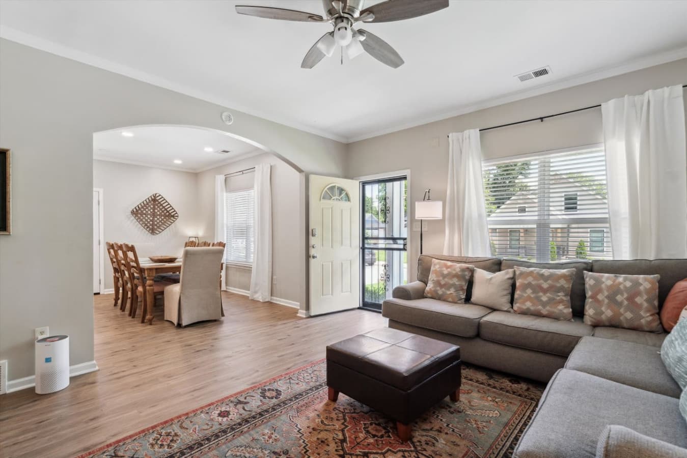 Open concept dining and living room space.