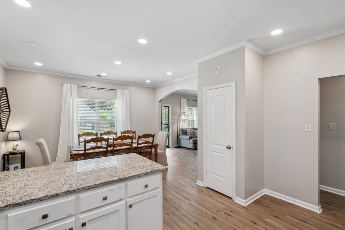 Open concept kitchen and dining room space.