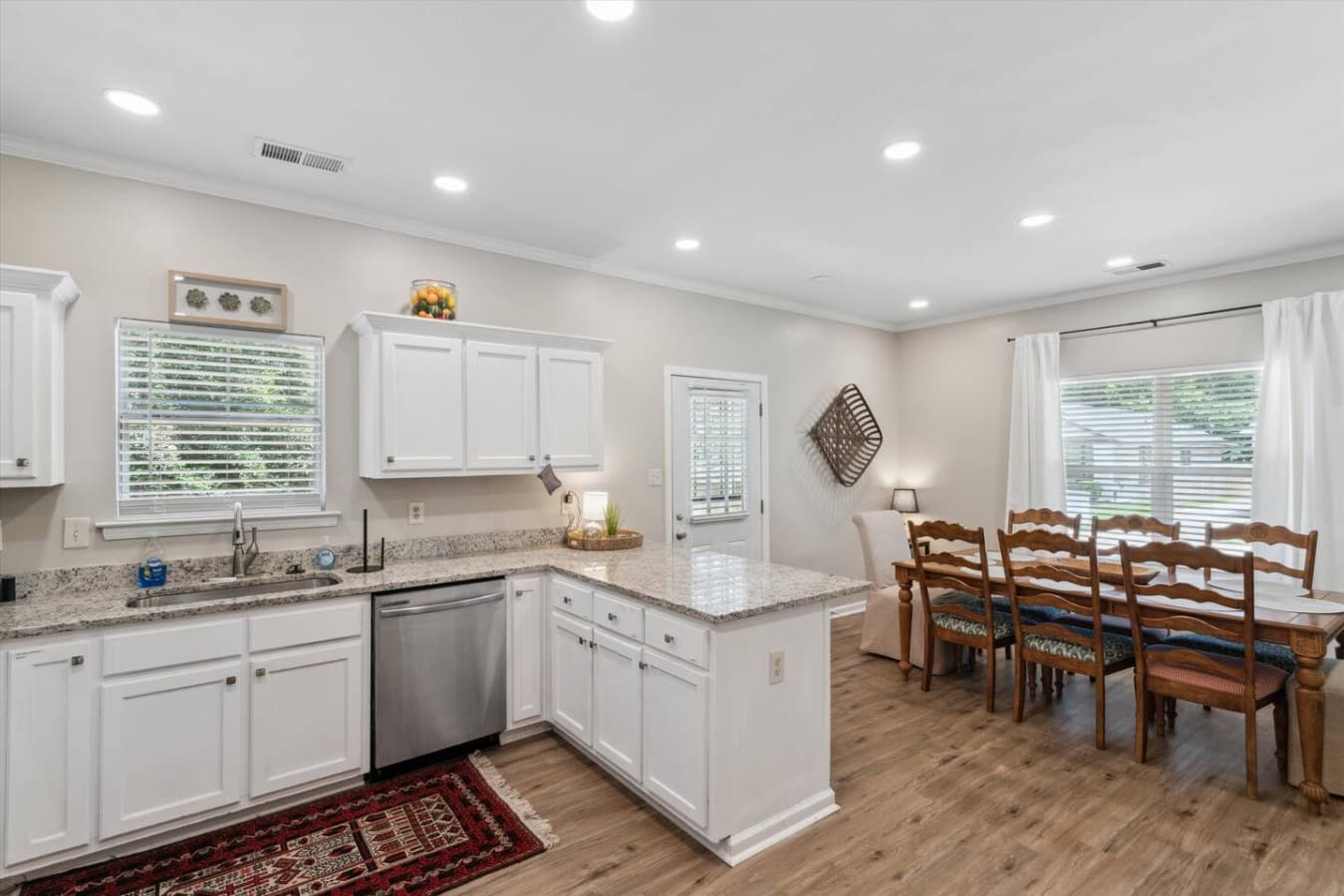 Open concept kitchen that blends seamlessly in the dining room space.