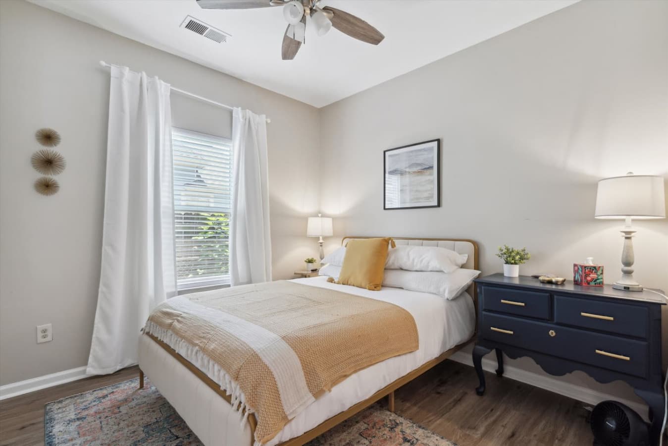 Experience ultimate comfort in the inviting third bedroom. The plush queen-size bed promises a restful slumber.