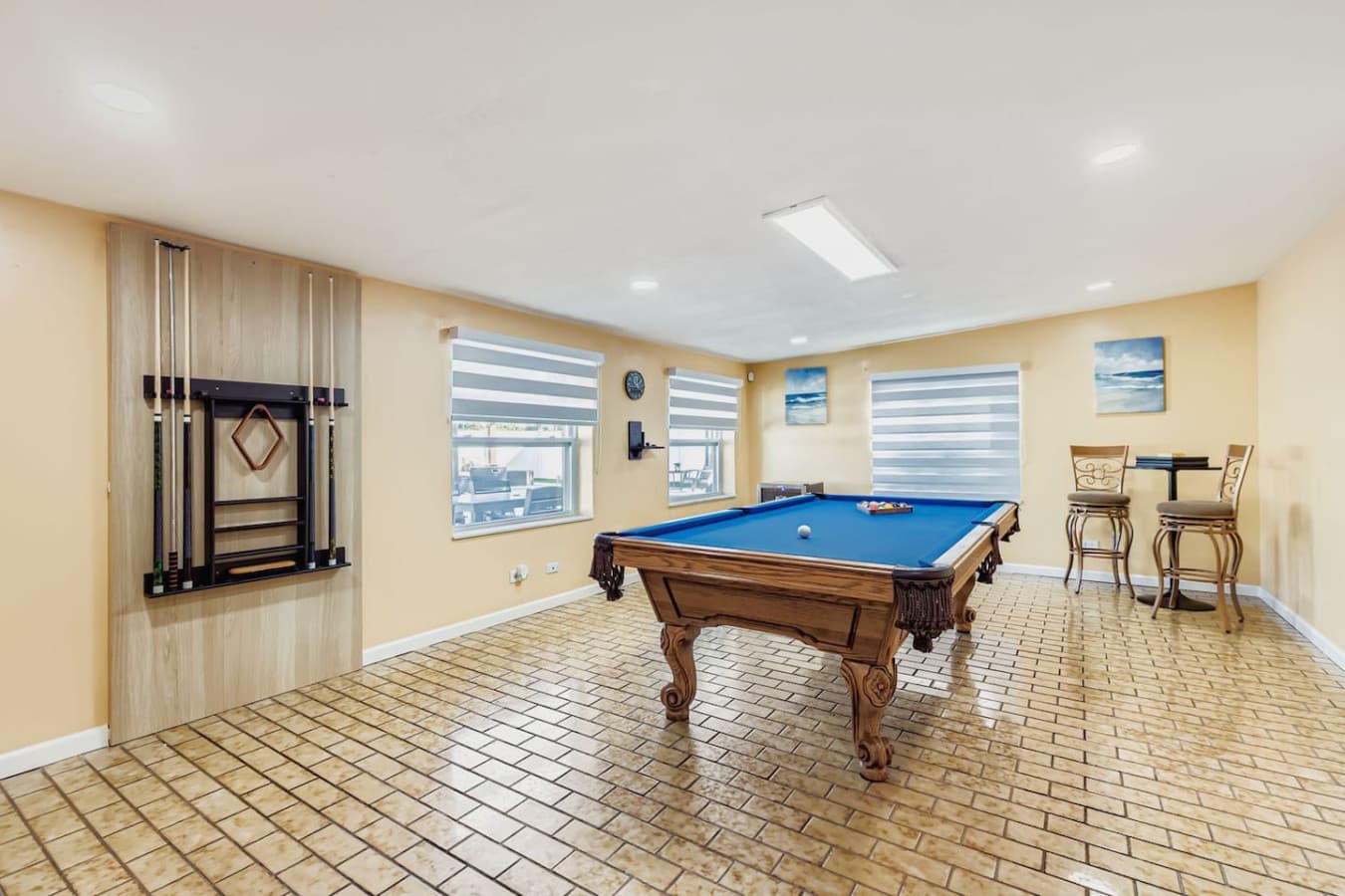 Relax, laugh, and make memories in this cozy game room designed for friendly competition.