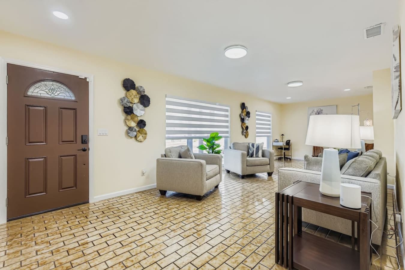 Whether you're planning a quiet night in or a casual hangout, this living room offers the perfect setting with comfort and style in every corner.