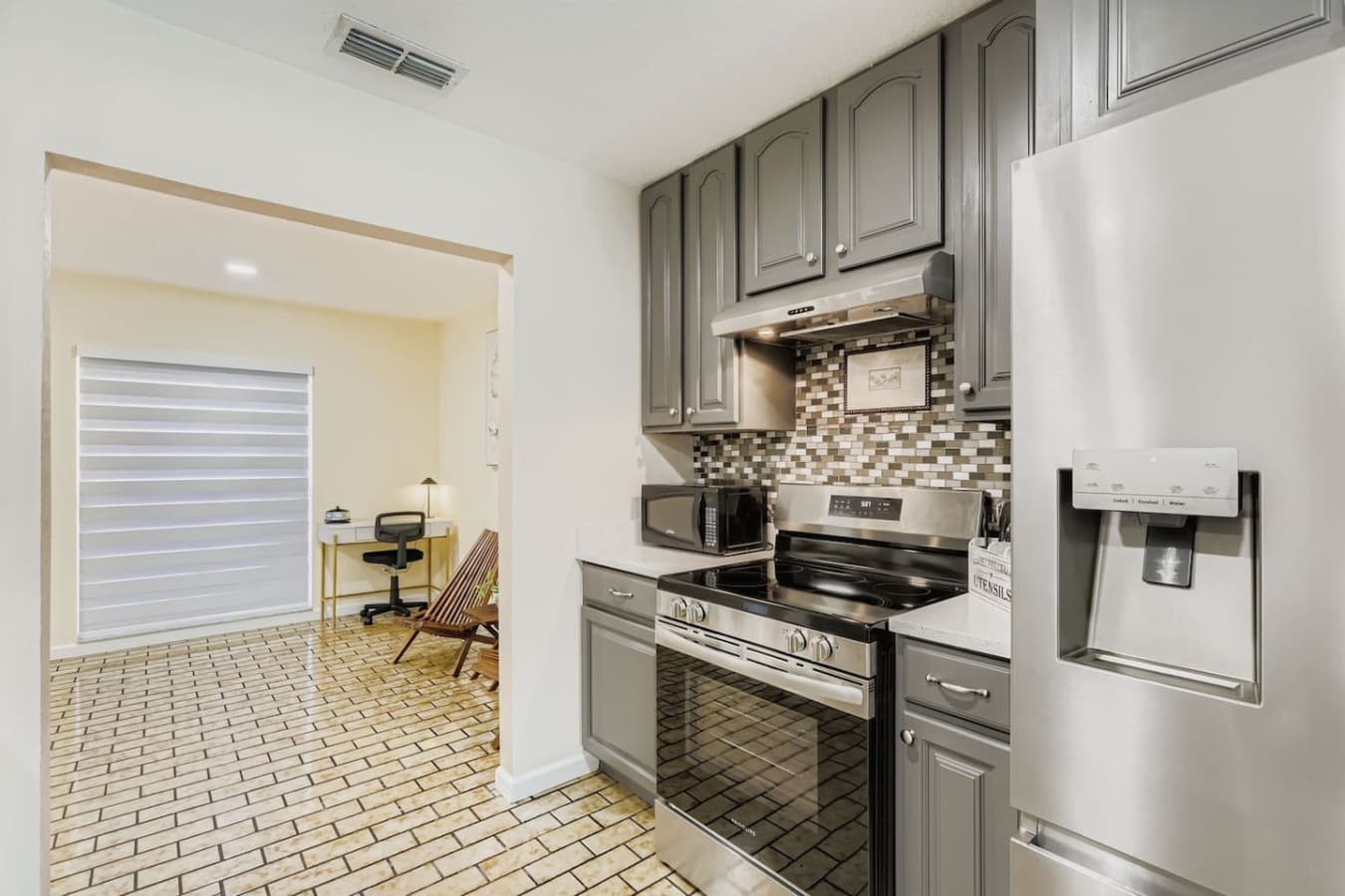 This kitchen complete with cookware, utensils, and style to spare.